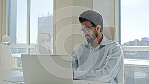 Tired stressed Arabian Indian man businessman upset guy executive manager employer overworked read business documents