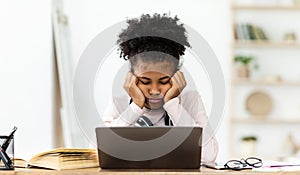 Tired Teenager Girl Sleeping Sitting At Laptop Indoors