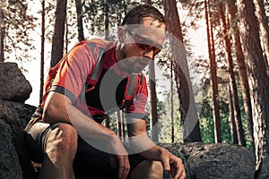 Tired trail running athlete