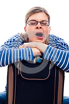 Tired traveller woman yawning