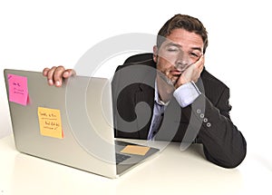 Tired wasted businessman working in stress at office laptop computer exhausted overwhelmed