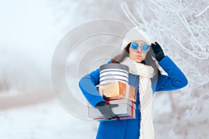 Tired Woman Carrying a Pile of Winter Christmas Gifts