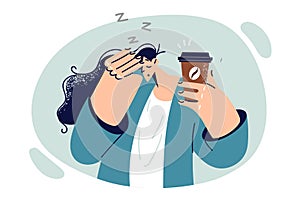 Tired woman drinks coffee to get rid of drowsiness and energize drink containing caffeine or taurine