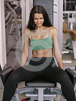 Tired Woman in a Gym After Workout