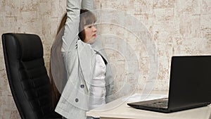 Tired woman office worker sleeping on the desk at work. business woman was weakened at work and fell asleep at the