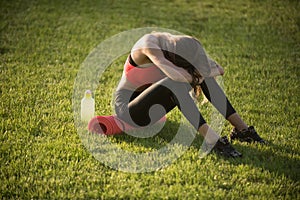 Tired woman in sportswear relax after workout, training