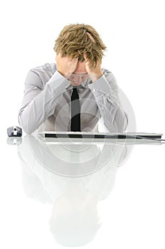 Tired workaholic sleeping at his desk