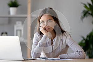 Tired young woman feel bored working at laptop