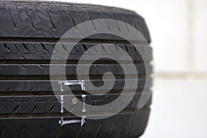 Tires on the floor are damaged by hitting nails or sharp objects