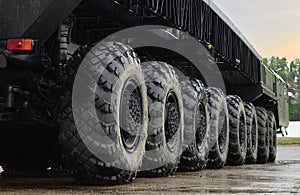 Tires of the heavy duty truck for transport missile defence system and oversized cargo. Wheeled chassis of a military transporter