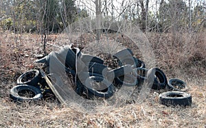 Tires Illegally Dumped in a Field.