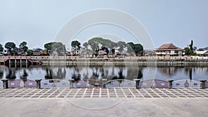 Tirtonadi dam view with water reflection. Solo, Central Java