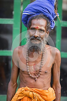 TIRUVANNAMALI, TAMIL NADU, INDIA - MARCH Circa, 2018 . Portrait Sadhu at Ashram Ramana Maharshi. Sadhu is a holy man, who have cho