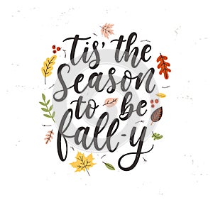 Tis` the season to be fall-y lettering card with colorful leaves and grunge effect photo