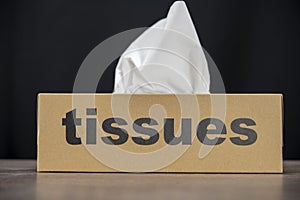 Tissue box with the product name on