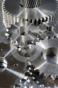 Titanium and steel gear wheels photo
