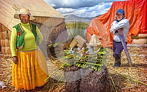 TITICACA, PERU - DEC 29: Indian woman and men peddling her wares