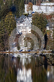 Titisee-Neustadt, Germany - 10 30 2012: beautiful white house castle on the coast of Titisee