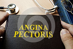 Title Angina pectoris on a book.