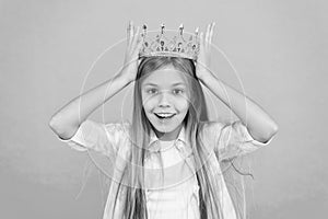 Title miss little princess. Girl wear crown blue background. Cute emotional sincere princess. Kid wear golden crown