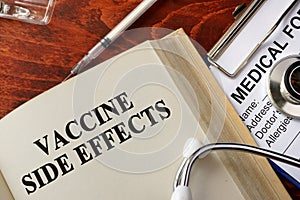 Title vaccine side effects.