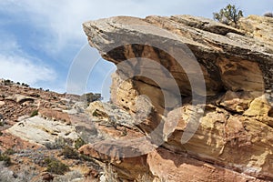 Titled eroded sandstone strata at the opening of No Thoroughfare Canyon