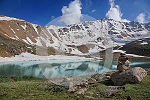 Titov peak and lake in Tian Shan mountains, Kazakhstan