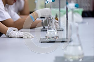 Titration technique in the laboratory.