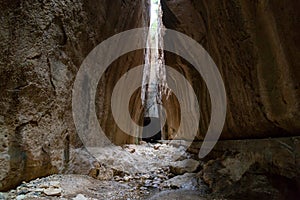 Titus tunnels are ancient Roman waterways carved into rocks in Besikli Antakya, Turkey photo