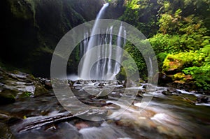 Tiu Kelep Waterfall near Rinjani, Senaru Lombok indonesia. Southeast Asia. Motion blur and soft focus due to Long Exposure Shot.