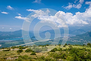 Tivat city and airport landing strip photo