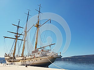 Big white sail ship docked to the pier in Tivat, Montenegro