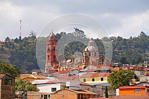 Church  and houses of Tlalpujahua in michoacan, mexico II photo