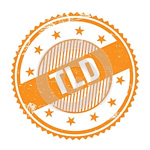 TLD text written on orange grungy round stamp