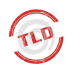 TLD text written on red grungy round stamp