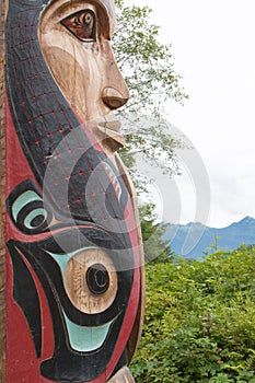 Tlingit Alaskan wood Carving mother nature looking out over the land and sea photo