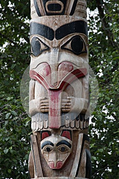 Tlingit Alaskan wood Carving sticking tongue out photo