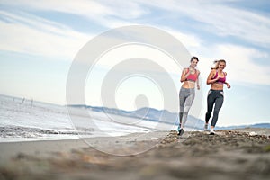 To Be Young exercise. Healthy  Woman  running on beach