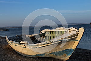 To become older by the sea. abandoned boat. fresh air. long walking in Sand Island in Canakkale in Turkey.