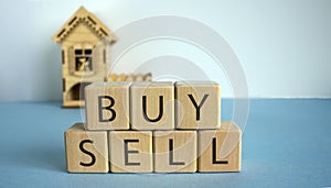 To buy or sell a house? Cubes form the words