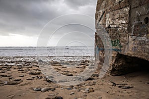 Beside to a casemate on French west coast beach photo