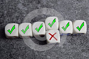 To correct a mistake. Recognize the error and correct the mistake. fixing the problems on wooden cubes or dice photo