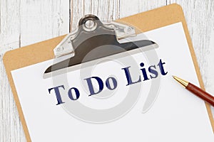 To Do List message on paper with a clipboard