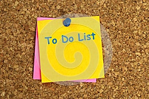 to do list postit on corkboard