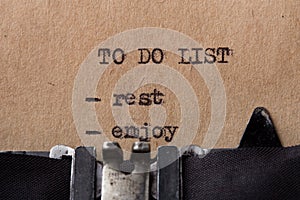 To do list sleep, relax, enjoy - text message on the typewriter close-up