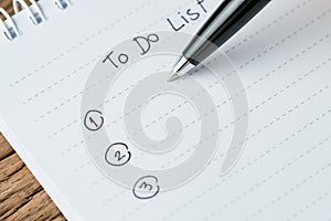 To-do list or writing tasks priority concept, close-up of list o