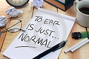 To err is just normal. Motivational Text photo