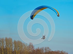 To fly on a paraglider, to be engaged in sports on a motor paraglider, paragliders are fond of flights