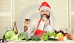 To merry xmas. Chef man in hat. Secret taste recipe. Bearded man cook in kitchen, culinary. Healthy food cooking