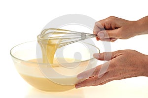 Preparation of the pancake batter in a salad bowl